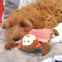 Load image into Gallery viewer, A young dog resting on a soft plush monkey toy
