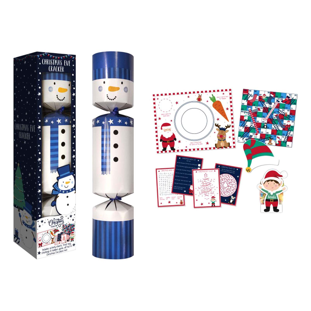 Snowman Christmas Eve cracker with contents next to it